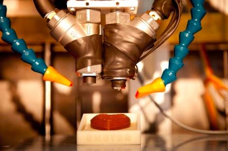The University of Exeter, Brunel University, and Delcam are collaborating on a 3D printer that uses chocolate as the materials medium.