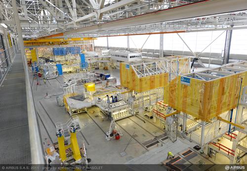 A new class of self-monitoring adhesives may help to predict failure in structural composites used in aircraft such as the Airbus A350 XWB, shown here in its final assembly line in Toulouse, France. Source: Airbus
