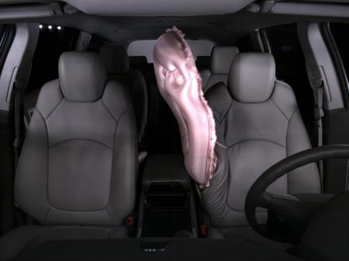 The front center airbag, introduced this year on the GMC Acadia, specifically targets opposite-side crashes. With this airbag, the driver's momentum toward the center of the vehicle is cushioned. One benefit: front-seat passengers can't bang heads.   (Source: GM)