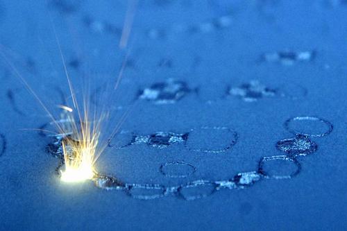 EOS's latest system for direct metal laser sintering (DMLS), the EOSINT M 280, helps create cobalt chrome dental copings and bridges.   (Source: EOS)