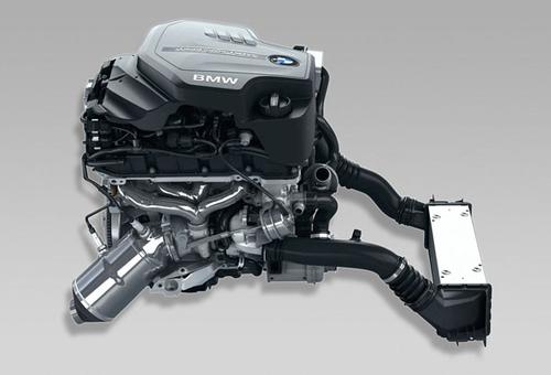 
BMW's TwinPower Turbo four-cylinder combines direct fuel injection, Double-Vanos variable camshaft timing, Valvetronic variable valve timing, and twin-scroll turbocharging.   (Source: BMW)
