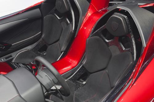 The new Lamborghini Aventador J roadster not only uses carbon-fiber composites throughout the car, but also features a new interior upholstery material called CarbonSkin.   (Source: Lamborghini)
