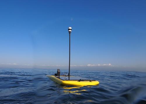 Liquid Robotics touts its Wave Glider wave-powered, autonomous, unmanned marine vehicle (UMV) as the world's first marine robot that can operate independently for a year or more at sea without needing maintenance. In fleets, the surfboard-sized robots can form data gathering networks. They are designed for predicting weather patterns, monitoring marine ecosystems, and gathering data about climate change, oil slicks, and algae blooms. Other applications include reconnaissance and surveillance. Their propulsion system mechanically converts wave motion into forward movement, and payloads are solar energy-fueled. Each weighs about 90 kg and has an average speed of about 1.5 knots. Recently, four of them broke a world distance record for unmanned devices, traveling more than 3,200 nautical miles across the Pacific Ocean.   (Source: Liquid Robotics)
