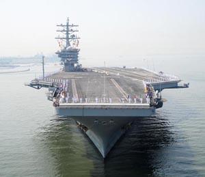 The Navy has granted University of Wisconsin researchers $2 million to develop a tool that can model the performance of biofuels to help identify one it can use to power aircraft carriers, like the one shown, as well as submarines and other seafaring vehicles. The work is part of the military's ongoing interest in exploring alternative methods to fossil fuels for energy.   (Source: Navy)