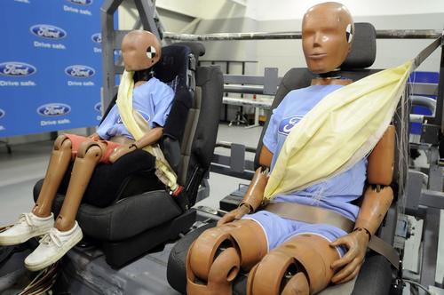 In 2009, Ford introduced the industry's first production inflatable seat belts, which are designed to spread crash forces over five times more area of the body than conventional belts. Used for rear-seat occupants, the inflatable belts help reduce pressure on the chest and control head and neck motion. (Source: Ford Motor Co.)