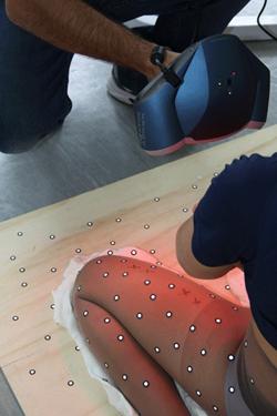 The team scans Australian Olympic Kayaker Jessica Fox with Creaform REVscan to capture her lower body shape.   (Source: Creaform)