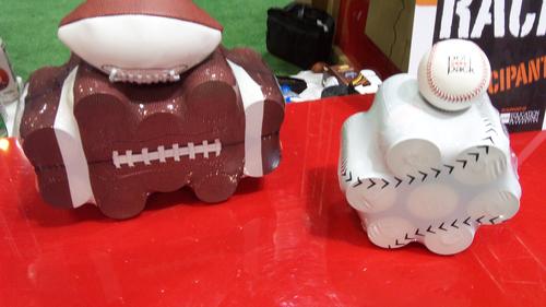 Polypack Inc. brought a sports theme to the packaging show with polyethylene wrappers designed to look like baseballs, basketballs, and footballs. The sports wrappers can be used for juice packs and canned goods. 