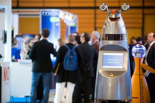 This random guide robot from Japan, roaming the Innorobo expo, appears either happy or bloodthirsty - I can't decide which. Jetro is looking to move bots of this nature from Japan to the US. A robot-laden future awaits. (Source: Jetro)