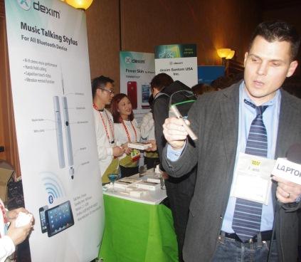 Dexim Santom USA showed several products, including the Music Talking Stylus, designed for use with iPhones and iPads. Besides serving as a touchscreen stylus, the pen communicates via Bluetooth with your smartphone and tablet, allowing users to listen wirelessly to both music and phone messages. The stylus comes with a built-in volume button.