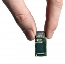 Electronics & Test:
Embedded Computing/Processing
Logic PD
Logic PD Torpedo + Wireless System on Module
The Logic PD Torpedo + Wireless (T+W) System on Module is embedded technology that encapsulates the most complex design components on a dime-sized board and offers wireless capabilities, high performance, and the lowest power consumption available. 
OEMs employ the T+W SOM to design end products easier and deliver them to market faster. This SOM offers designers a tiny, off-the-shelf wireless interface that enables remote connectivity and eliminates the local user interface. It allows developers to dramatically condense hardware space requirements and increase system performance.
Ten times smaller than the competition, the T+W SOM can provide instant on functionality by loading mission-critical drivers and peripherals in the Linux BSP. This supporting software is highly attractive to companies that develop life-critical battlefield and medical devices as it makes new technical developments possible. Customized to meet specific product requirements, this advancement enables Logic PD SOM customers to develop battery-powered devices that power on significantly faster than competing end user products, and give end users the ability to use their devices faster and for longer periods of time.

The T+W SOM is FCC certified, which saves customers significant time and money by reducing design risk and shortening the final EMC testing phase. Logic PD developed the T+W SOM based on Texas Instruments' DaVinci DM3730 video processor and WiLink 7.0 combo connectivity solution. The SOM provides PC-like speeds up to 1 GHz, long battery life, and a WL1283 wireless chipset that includes 802.11a/b/g/n, Bluetooth with a roadmap to support GPS.  Based on these technologies Logic PD developed the hardware, software, and technology integration for its embedded solution.  
