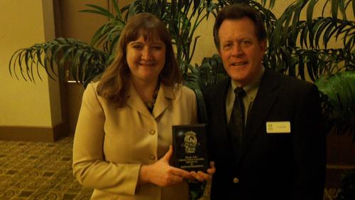 Gina Kelso of Analog Devices, seen here with Design News Sales Director Al Schmidt, walked away with two Golden Mousetrap Awards on the company's behalf. Analog Devices won Golden Mousetrap Awards in the Electronics & Test: Components, Hardware & Interconnects category, for its AD9670 Octal Ultrasound Receiver; and in the Automation & Control: Sensors, Vision Systems, Feedback Devices category, for its ADXL362 Lowest Power MEMS Accelerometer.   (Photo: Chuck Murray/Design News)