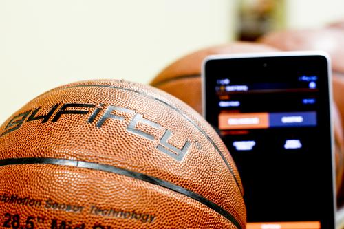 InfoMotion's smart basketball gathers information about shooting or dribbling, and then sends it wirelessly to a smartphone or tablet computer.   (Source: InfoMotion Sports Technologies)