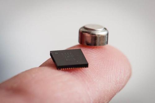 Small processor next to a battery (c) 2014 IMEC