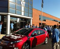EIT Engineers and technicians gather around the Drive for Innovation Chevy Volt  in Sterling, Va. A plant five hours south gives EIT an 'offshoring' cost basis. 
