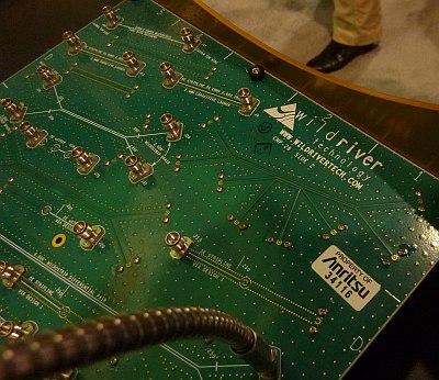 A closeup of the CMP-28 channel modeling board from Wild River Technology shows the test structures that can be used for VNA calibration before measurements on an unknown structure.