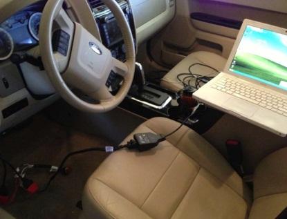 A laptop communicating with the CAN bus. (Source: tech paper authored by Charlie Miller and Chris Valasek)