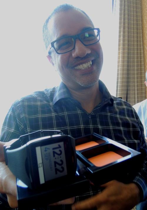 Rob Chandhook, who runs Qualcomm's AllJoyn program, showed the press Toq in its carrying case that doubles as a WiPower LE wireless charger for the watch and its stereo Bluetooth headsets.