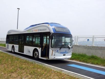 As they travel, these prototype buses (now in testing) recharge from coils buried in parts of the roadway.