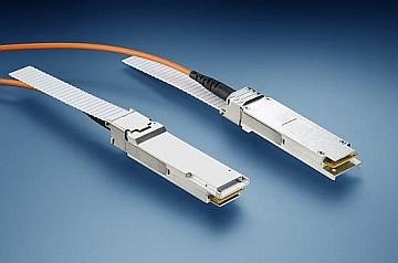 An active optical cable has optical/electrical converters at each end, such as these QSFP+ modules. (Source: Finisar)