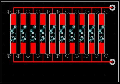 Figure 2. Panel with many small boards. Don't let the scale fool you -- each board is 5mm x 20mm. It is not clear, but the white surround indicates each board's cutout. The breakouts aren't very clear here. Observe the two test points on the right. (Click here to see a larger, more detailed image.)