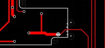Figure 3. Observe how the track passes between the breakout holes and connects to a through-hole (a component in this case) on the PCB. (Click here to see a larger, more detailed image.)