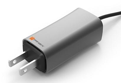 A miniature 65-W wall-plug laptop power adapter from startup FINsix uses very-high-speed switching to shrink its size to one fourth that of traditional adapters.