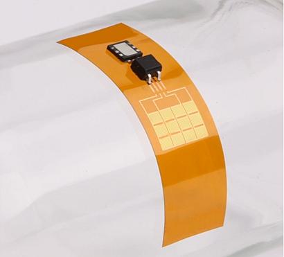 A thin, flexible mechanical energy harvester, with a rectifier and microbattery, could power an implantable device like a pacemaker indefinitely when implanted on a constantly moving organ.(Source: University of Illinois/University of Arizona)
