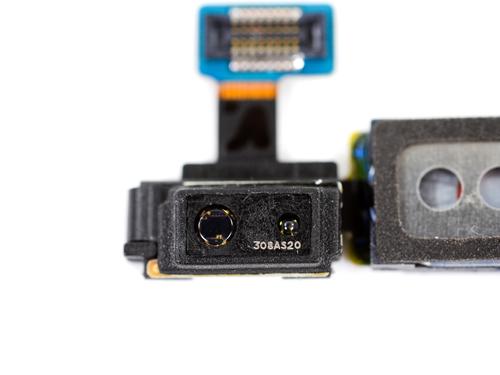 A look at the IR sensors in Samsung Galaxy S4 phone from iFixit's teardown: 'The placement of the two IR sensors on either side of the earpiece speaker explains how Samsung's new Air View/Air Gesture feature operates. By comparing IR light reflected from your hand into each of the sensors, the phone can track sideways motion as you gesture without touching the screen.'(Source: Fixit)