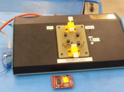 The Rabbit module is programmed via a flat ribbon cable. We made a bed-of-nails to program it, allowing the subcontractor to return the module if it fails, and saving wear-and-tear on (and subsequent replacement of) the flat cable. (Click here to see a larger image.)