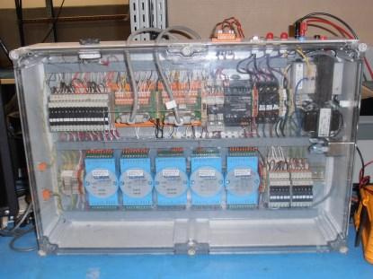 Figure 4. In this test jig, the control program (written in BASIC) interfaces to industry-standard ModBus modules. Even with the wide variety of options that are available with this approach, every so often you still have to make something custom.