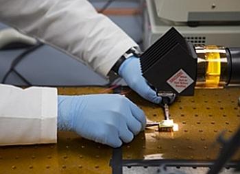 By adding a small amount of graphene nanoflakes to polymer solar cells -- which are thinner and more flexible than silicon solar cells, but not as efficient -- researchers have achieved a threefold increase in efficiency.(Source: University of Cincinnati)