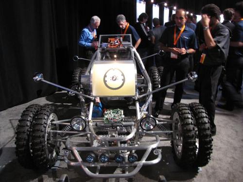 Freescale's Concept Car with
infotainment, dewarping HUD by i.MX6 series applications
processor; Qorivva MCU providing Ethernet, CAN, and Lin
gateways and cluster and camera (also i.MX6); S12 MCU and
analog ASICs provide battery managment and motor control.
(EE Times/Susan Rambo)