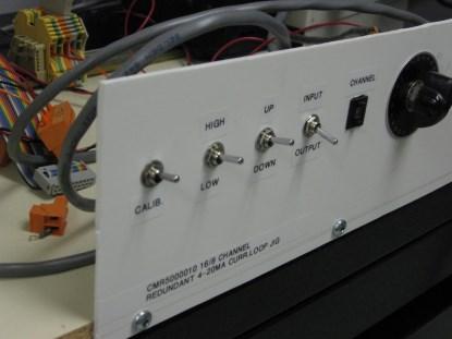 A simple test aid for a project. Often, with only a few minor modifications, this will become the test jig for production. (Click here for a larger image.)
