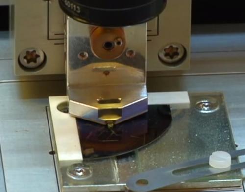 IBM's mechanism works like an atomic force microscope (AFM) but with a heated tip that can sculpt 3D nanometer resolution patterns.
(Source: IBM)