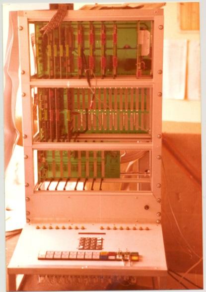 The development central rack controller containing the microprocessor (top left as can be seen by the connected emulator), memory, display (LED alphanumeric), keyboard, and some I/O drivers.