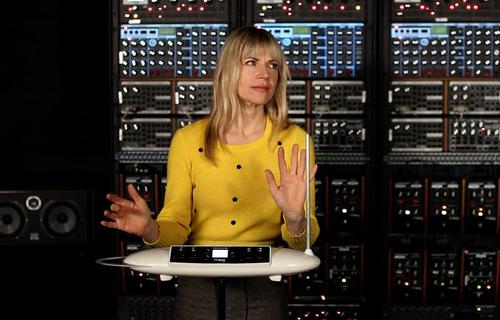 Renowned thereminist Dorit Chrysler playing Moog's Theremini from a bank of music synthesizers.
(Source: Moog Music)