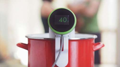 Version 2.0 of Nomiku's sous vide immersion cooker has only three moving parts and a sleeker design than the original, reducing manufacturing costs substantially.