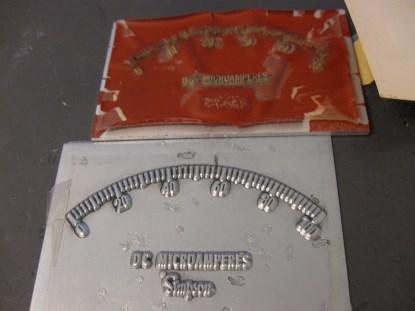 A zinc offset press plate and its plastic equivalent. As you can see, the plastic positive plates did not fare well over time. (Click here for a larger image.)