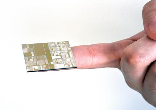 Close-up of IBM 7-nanometer node test chip produced at SUNY Polytechnic Institute's Colleges of Nanoscale Science and Engineering (Albany, New York).
(Source: Darryl Bautista/Feature Photo Service for IBM)