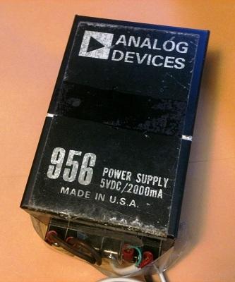 Don't drop this 5 V/2 A linear supply, you could break a toe-but it does inspire confidence due to the size and heft, which were considered state-of-the-art at the time, circa 1977. This epoxy-potted unit comes with four #4-40 threaded inserts for mounting it to a PC board or chassis with screws -- very convenient and necessary.