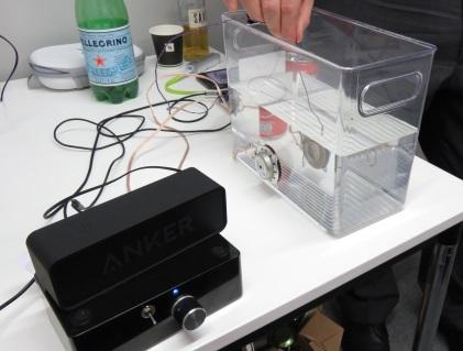 Vesper shows off how the company's MEMS microphones continues to work after it is dipped into a water tank