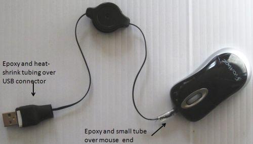 Figure 2: By careful use of epoxy, as well as heat shrink tubing and a piece of a pen refill, I have greatly enhanced the strain relief and, thus, the life of the mini mouse — I hope.