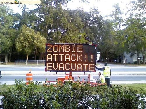 Portable traffic signs have come under attack from zombie-loving hackers.