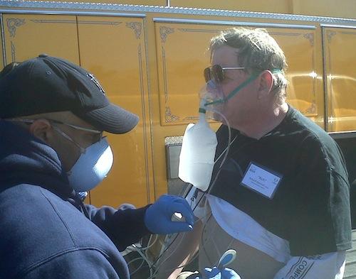 Getting checked out by the EMTs.