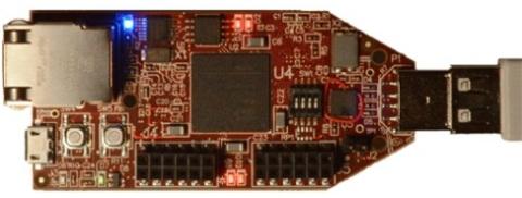 The development board with all four (red) LEDs lit up.
