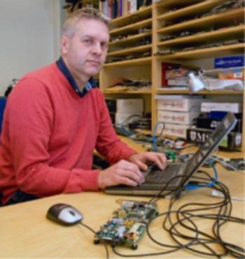 Goran Bilski working at his desk.