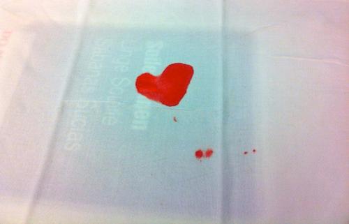 I started an IV on a patient, and drew a lab from it at the same time. As you see from the photo, things got a little messy. When I removed the pillowcase from under the patient's arm, we were both surprised to see the stain was a perfectly shaped heart of blood. We took it to be a good omen, and I photographed it. 
