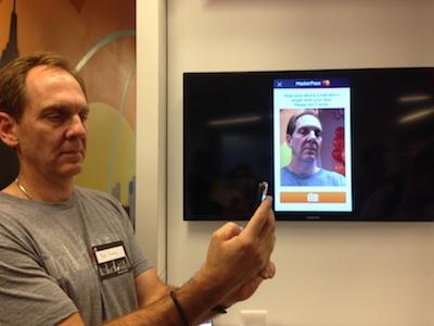 Bob Reany, MasterCard, showcases facial recognition authentication.