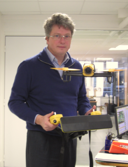 Henri Seydoux, Parrot's CEO, flying the Bebop drone in his office.