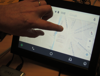 Apps (in this case, a map) reside in an Android phone, but you can touch and control them on the Simple Box's display.